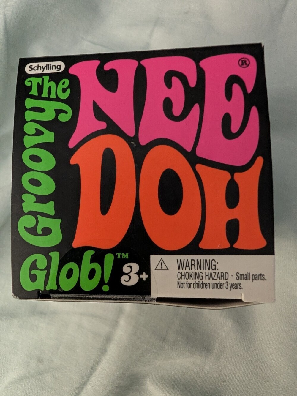 The Nee Doh Groovy Glob! Squeezable Sensory Ball - Blue